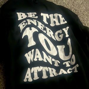 This is an all black hoodie. Lightly worn.